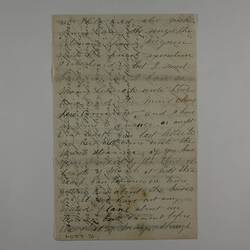 Handwritten letter with writing both across and up the page.
