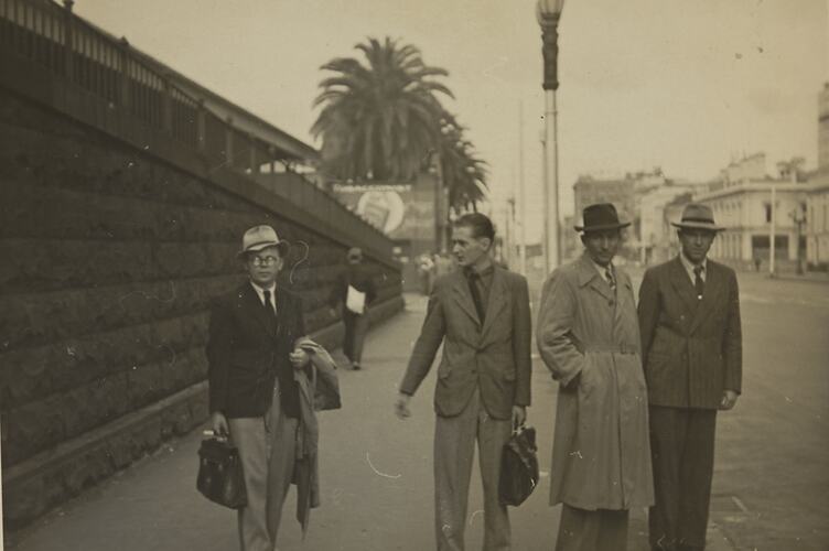 Four Men Walking on Flinders Street, Melbourn
