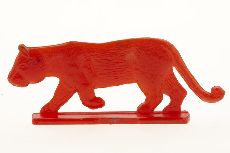Toy Lioness - Red Plastic, circa 1950s.