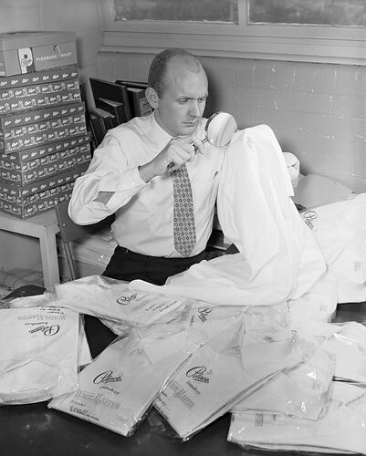 Pelaco Ltd, Man Inspecting Shirts, Richmond, Victoria, 1958