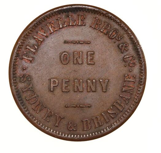 Copper penny with raised text.