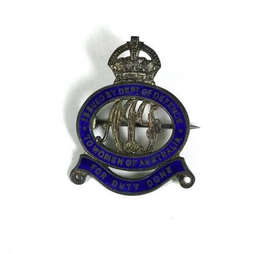 Silver badge wtih blue enamelling and crown at top