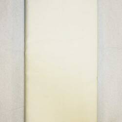 Back of sheets bundle, tied with tape.