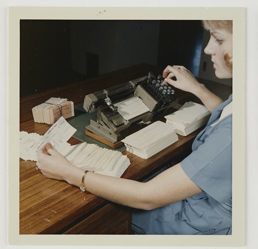 Slide C, Worker Operating Accounting Machine, 'A Look at Kodak Coburg Australia'  lecture series, circa 1960s