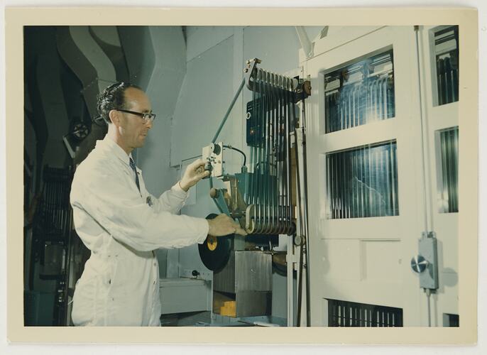 Slide 248B, 'Extra Prints of Coburg Lecture', Worker at Drying & Winding Machine, Building 20, Kodak Factory, Coburg, circa 1960s