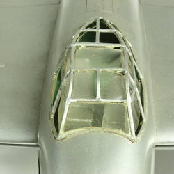 Silver model aeroplane.