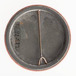 Metal back for round badge. Vertical pin.