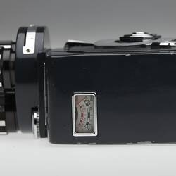 Underside of black plastic camera.