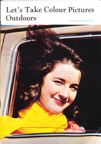 Cover page with young woman looking out of a car window.