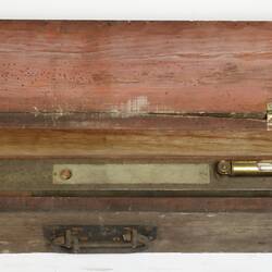 Detail of instrument in wooden box.