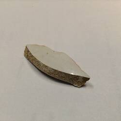 White ceramic fragment.