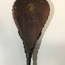Wooden bellows with sailing ship motif.