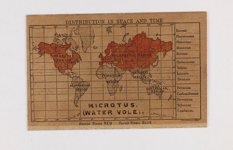 Retangular brown card with black and red text and map