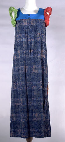 Cotton dress with batik print, different coloured sleeves.