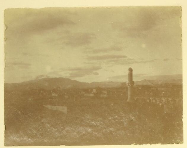 village with a minaret in the foreground.