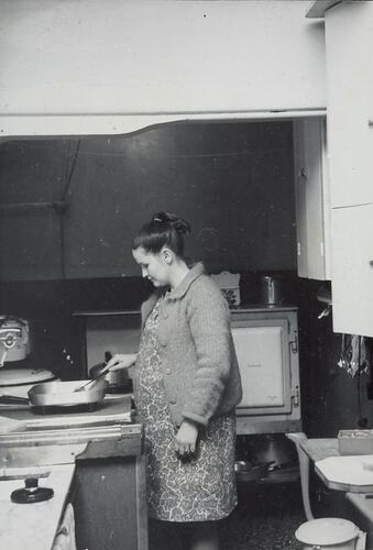 Digital Photograph - Pregnant Woman Cooking over Electric Frypan, Kitchen, Port Melbourne, 1965