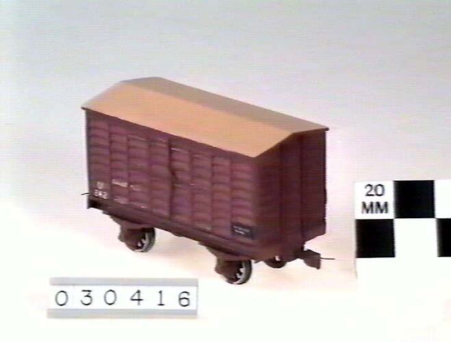 Model red box-shaped carriage.