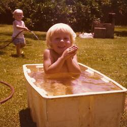 Child Playing in Tub of Water, Brighton East, 1976