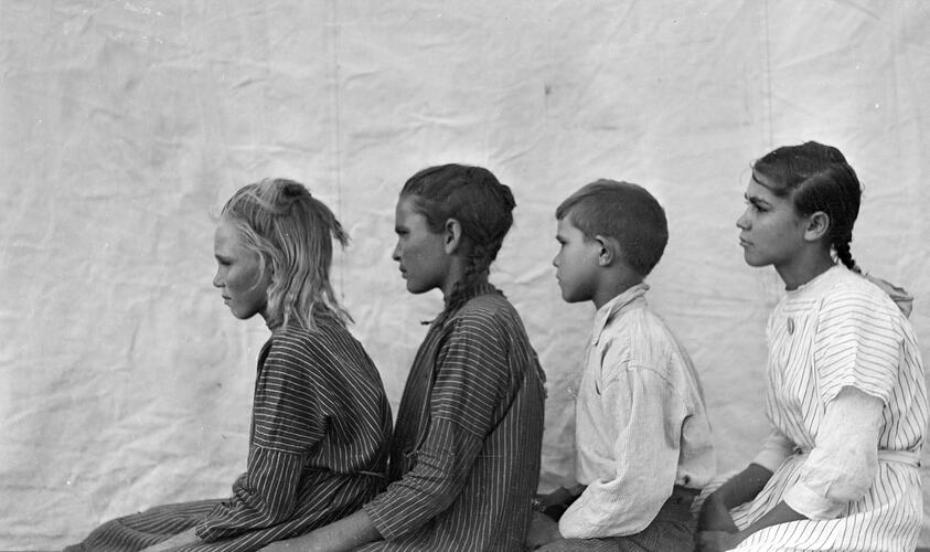 Portrait of four children in profile