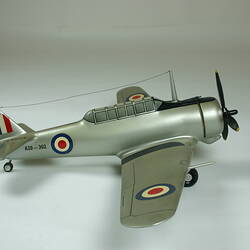 Plane, model with circles and flags painted on it.