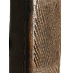 Wooden, wedge-shaped shield.