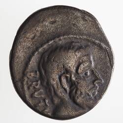 Round coin, aged, male profile, facing right.