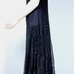 Side view sleeveless evening dress, black chiffon, lace.