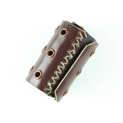 Cylindrical brown leather and rubber tourniquet with eyelet holes.