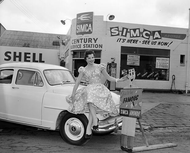 Century Service Station, Woman Sitting on Car, Richmond, Victoria, 30 May 1959