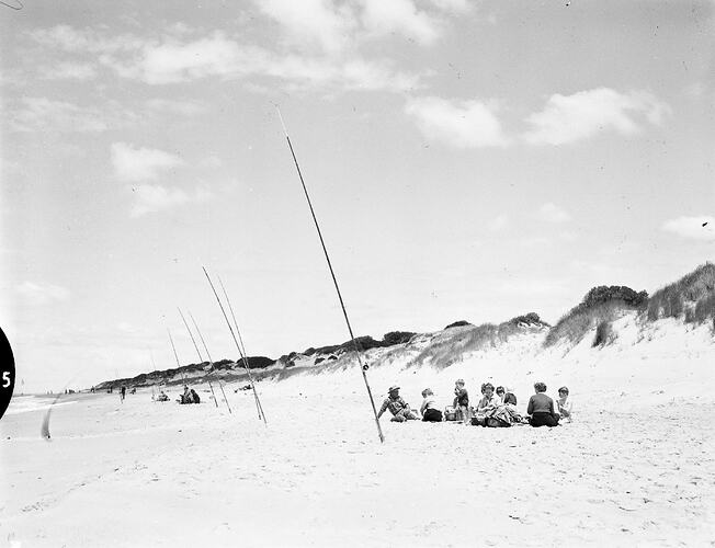 Monochrome photograph of a fishing competition.