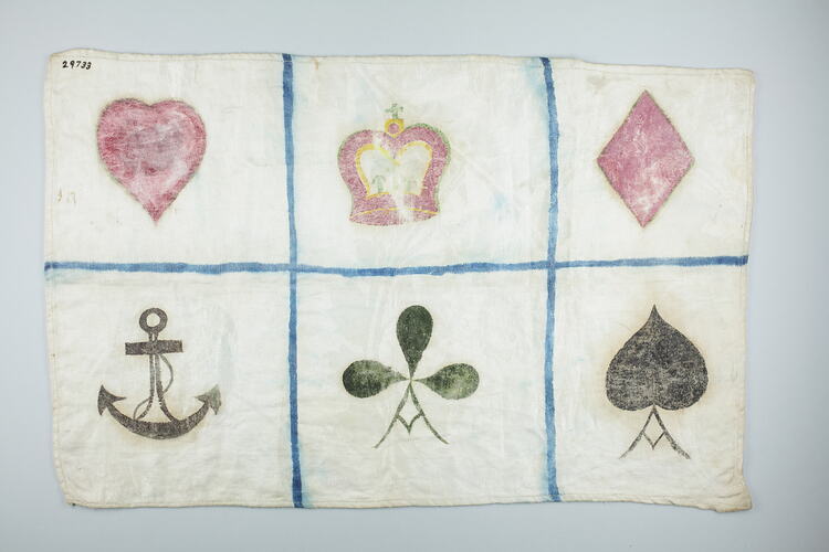 Rectangular cloth crudely marked with six symbols. Heart, crown, diamond above anchor, club, spade.
