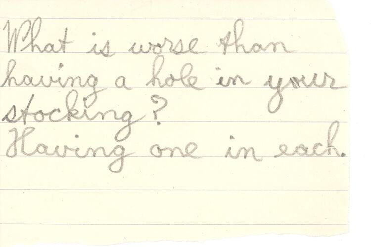 Handwritten annotation in pencil on lined paper