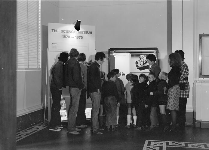 Crowd viewing the Canon camera display, Science Museum, Swanston Street, Melbourne, 1971
