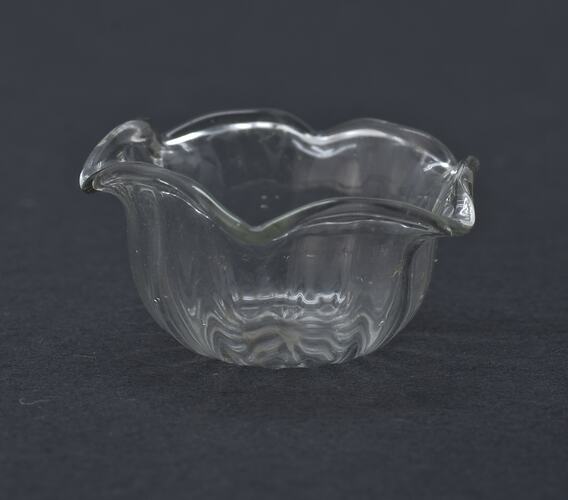 Miniature frilly glass bowl from a doll's house.