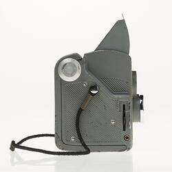 Grey metal camera. Right profile.
