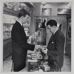 Photograph - Kodak Australasia Pty Ltd, John Kerr with Customer, Collins Street, 1961