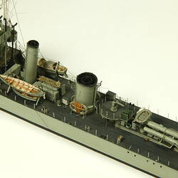 Grey coloured naval ship, detail of centre of deck.