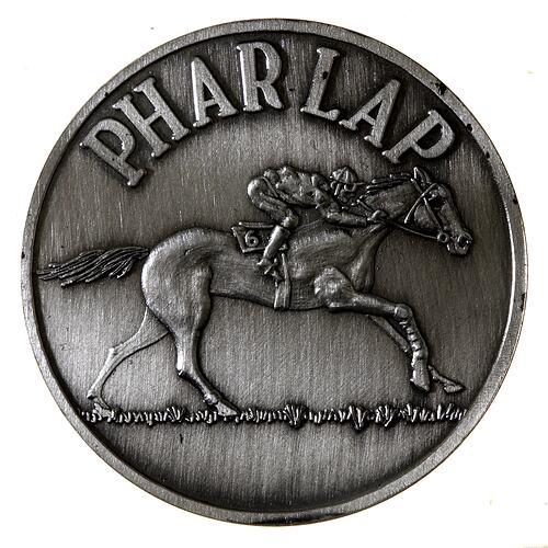 Silver medal with race horse design.