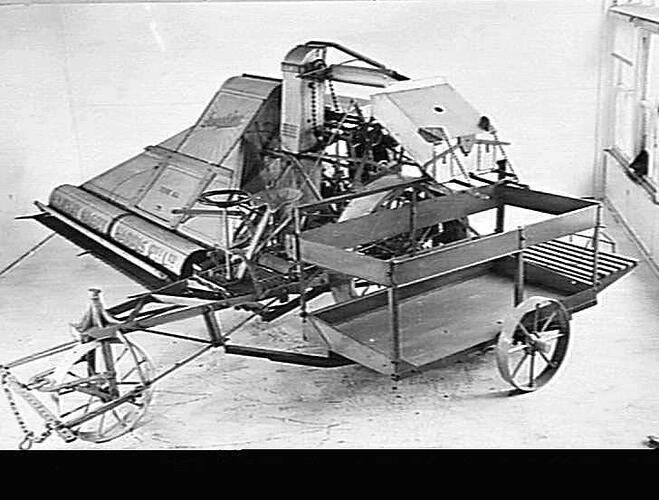 A. L. HARVESTER WITH [BAGGING-OFF] PLATFORM: AUG 1938