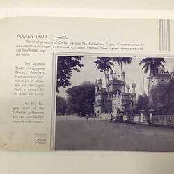 White page with dark blue text. Mosque lower right.