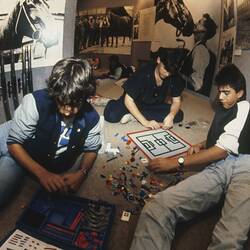 Digital Photograph - Johnny Verikakis, Evan Robotis & Angelo Arabatsis Creating Soccer Pitch with LEGO, Sunrise School, Melbourne Museum, Russell Street, 1989