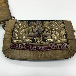 Brocade shoulder pouch and belt.
