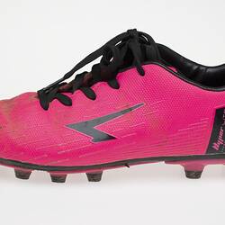 Pink Australian Rules football boot with black bootlace, inner sole and sole.