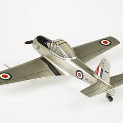 Back view model aeroplane, silver with black propeller and wheels. Red, white, blue roundels on wings, body and flag on tail.