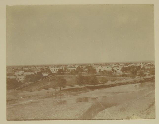 view looking over village from high vantage point.