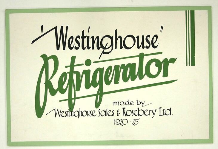 Card display label painted white with hand painted text in black and green.