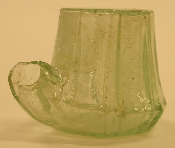 Glass - unknown.  Later identification as an inkwell.