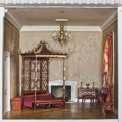 Miniature chinese style fully furnished bedroom in Doll's house.