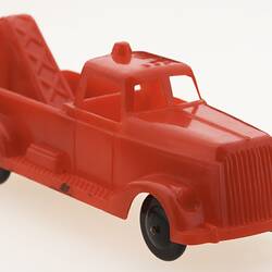 Red plastic toy truck