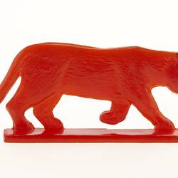 Toy Lioness - Red Plastic, circa 1950s.